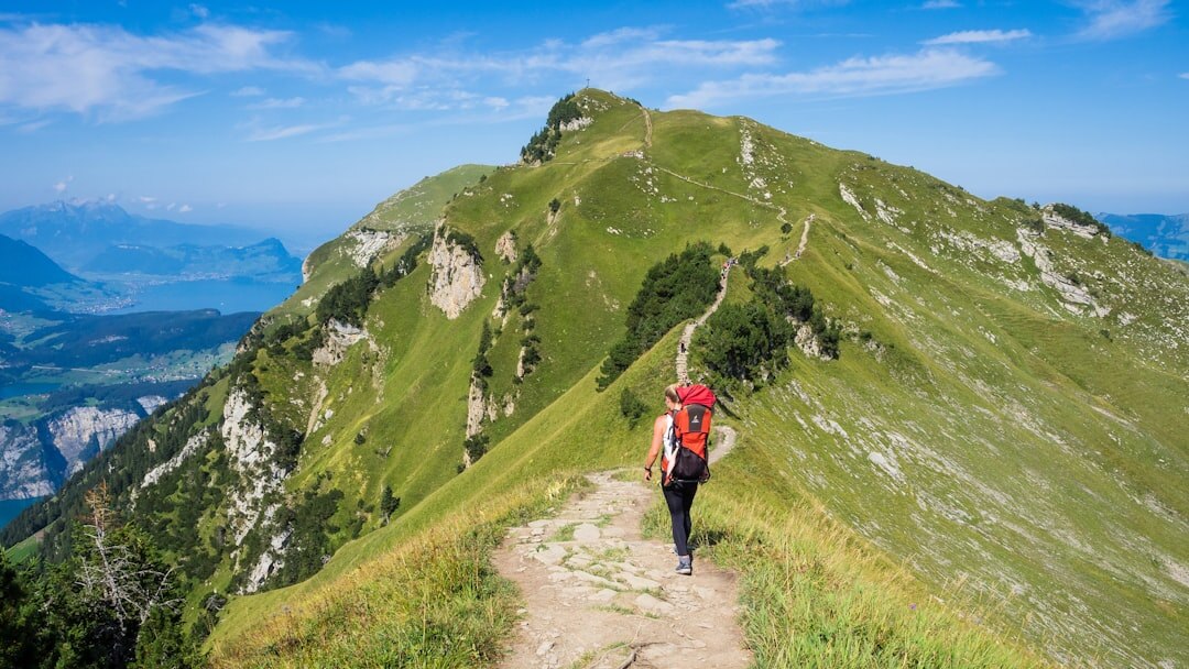 Croatian seniors hiking together on a scenic mountain trail