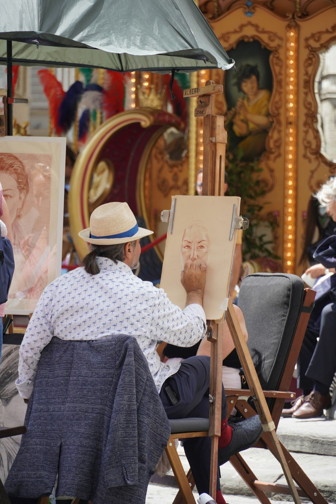 Croatian seniors painting together at an art workshop table