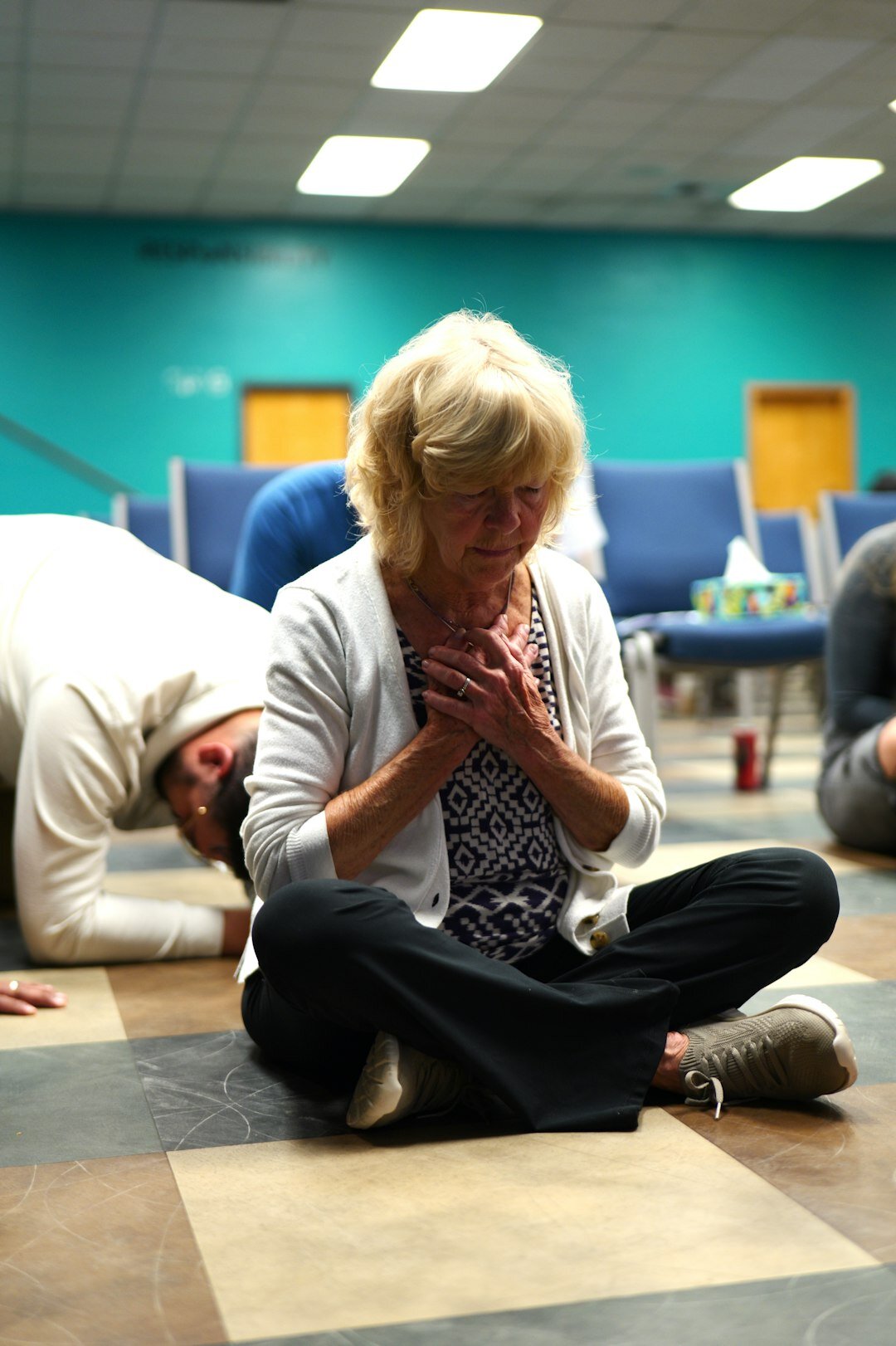 senior people doing gentle stretches