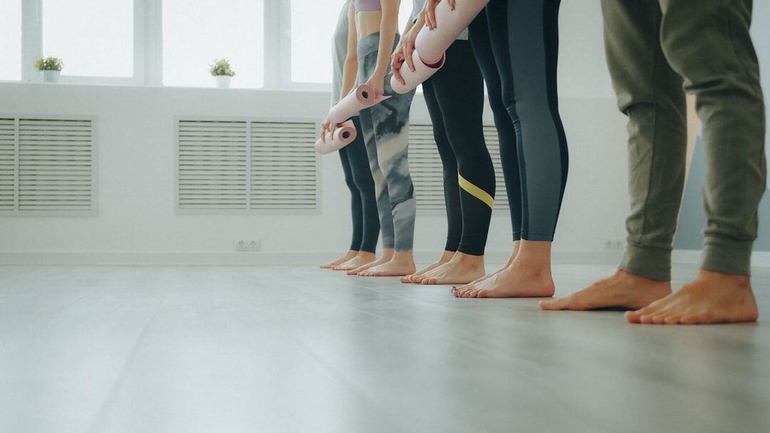 Croatian seniors doing a gentle gymnastics class in a community hall